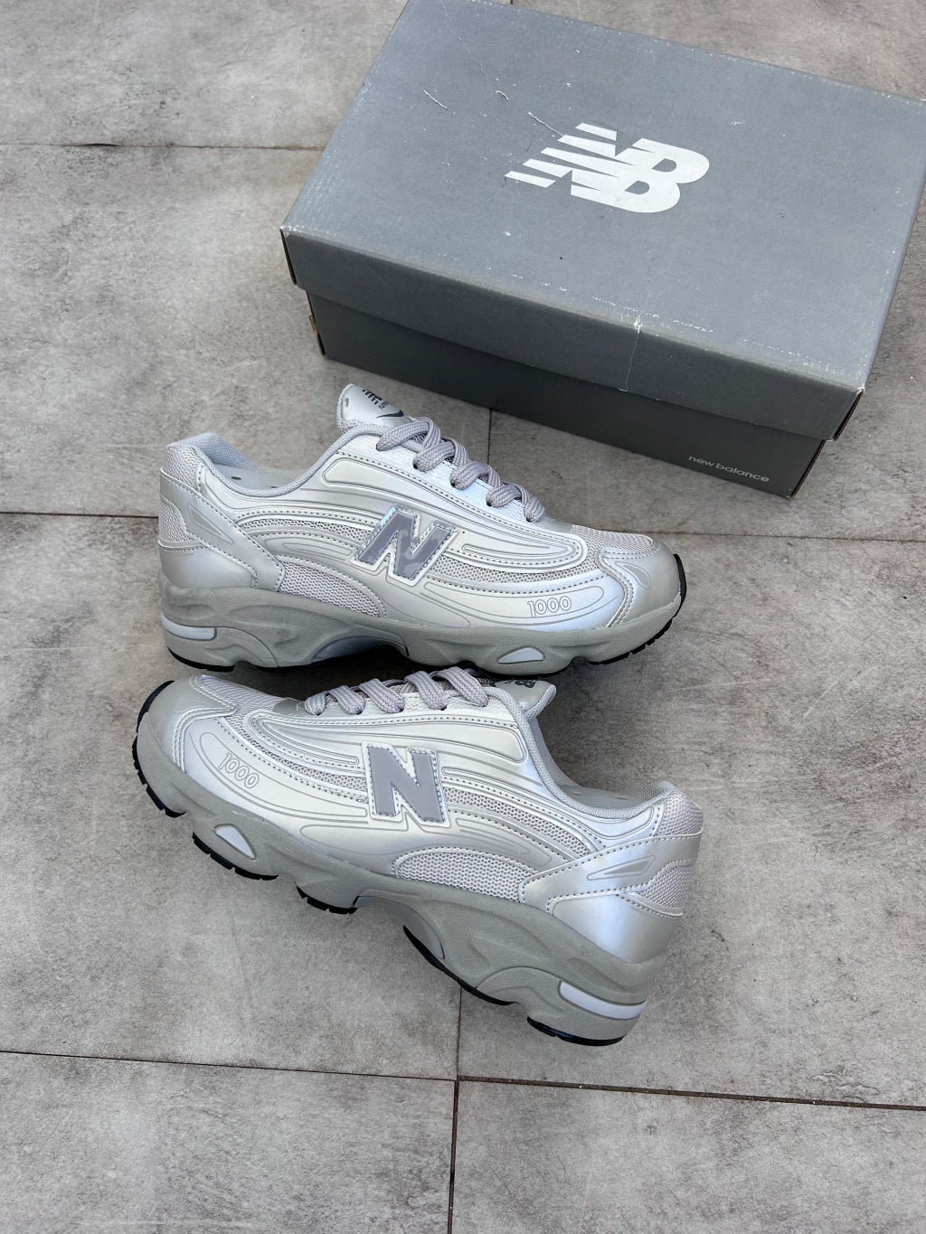 New Balance 1000 - Prata Refletivo